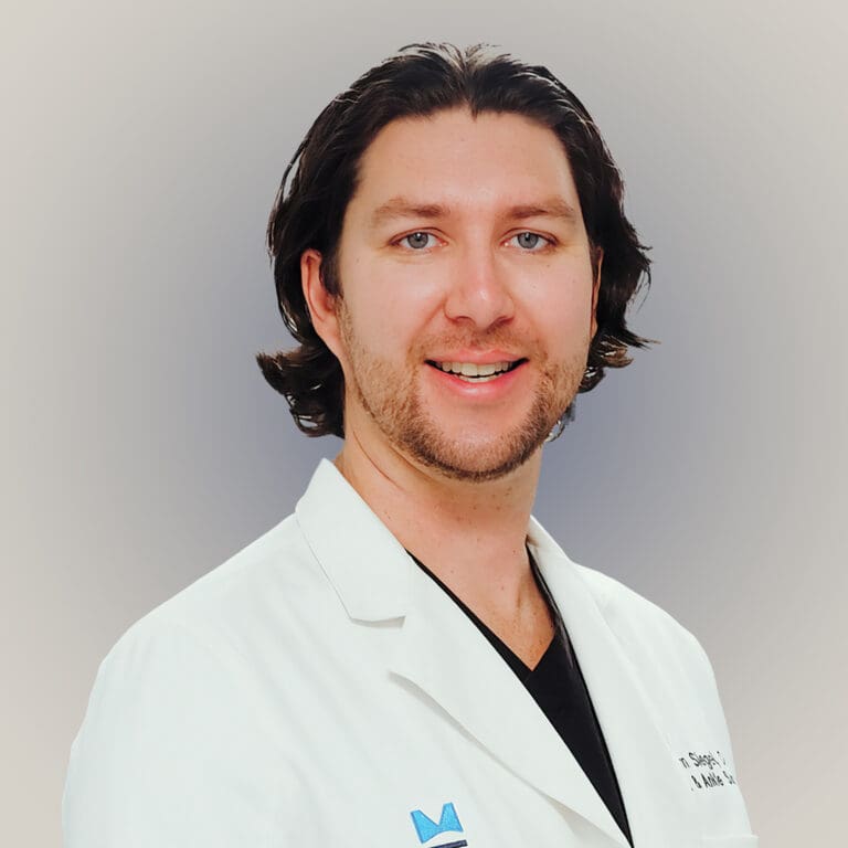 Close-up image of Dr. Kyle Haverstrom, a male Board Certified Podiatrist in Tampa, renowned for his expertise in minimally invasive procedures and sports medicine.