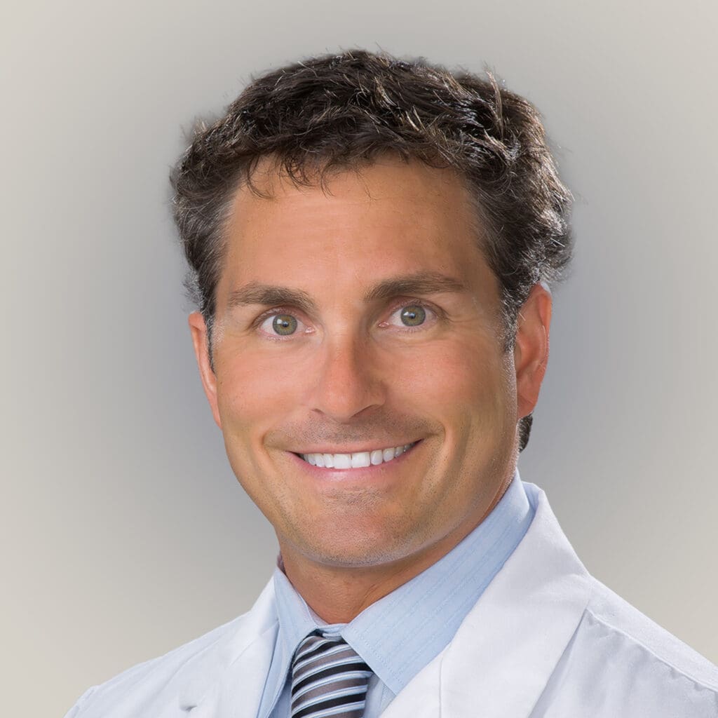 Dr. Cottom, a male Sarasota, Florida-based Podiatric Surgeon, known for reconstructive surgery in lower extremity pathologies and regenerative medicine.