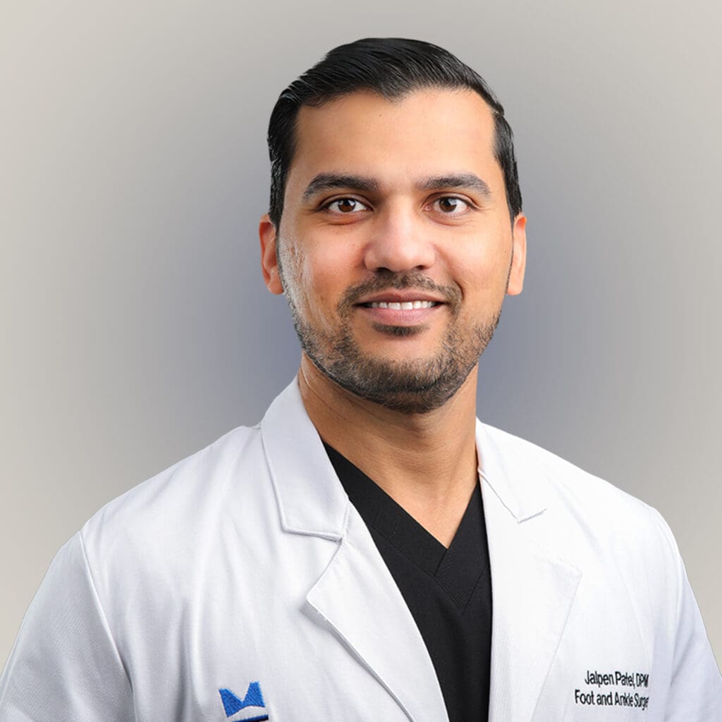 Portrait of Dr. Jalpen Patel, a male podiatrist in Orlando, specializing in minimally-invasive procedures and diabetic limb salvage.