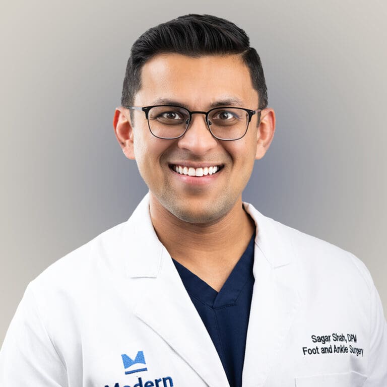 Close-up image of Dr. Sagar Shah, a male Board Certified Podiatrist in Tampa, known for his expertise in sports injuries and wound therapy.