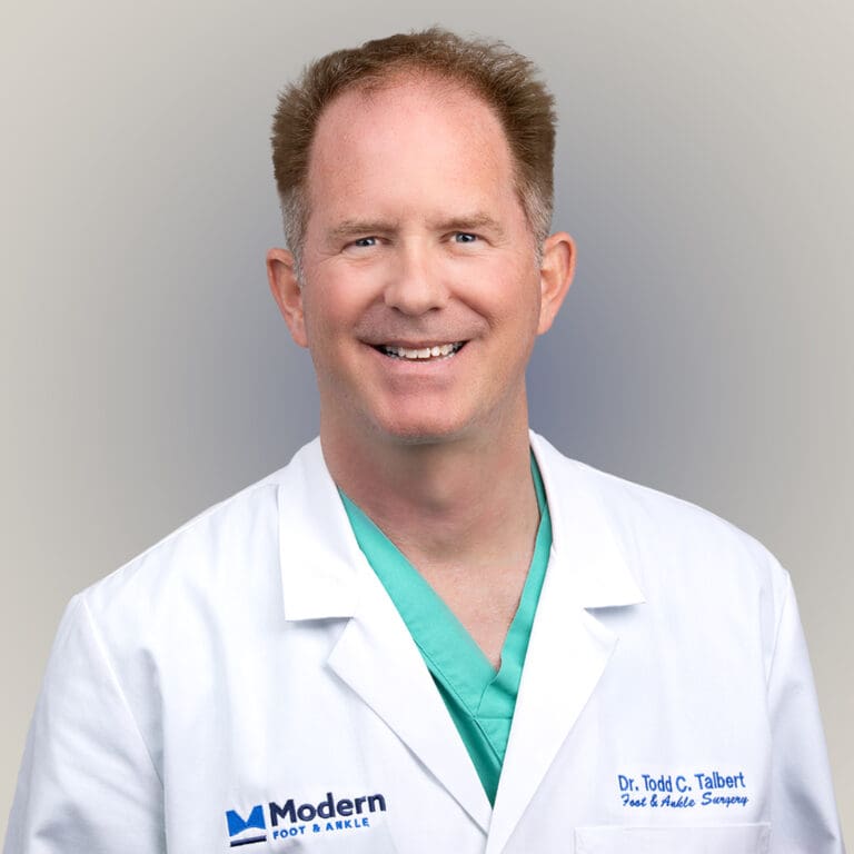 Headshot of Dr. Todd Talbert, a male Board Certified Podiatrist in Orlando, known for his expertise in sports medicine and reconstructive foot and ankle surgery.