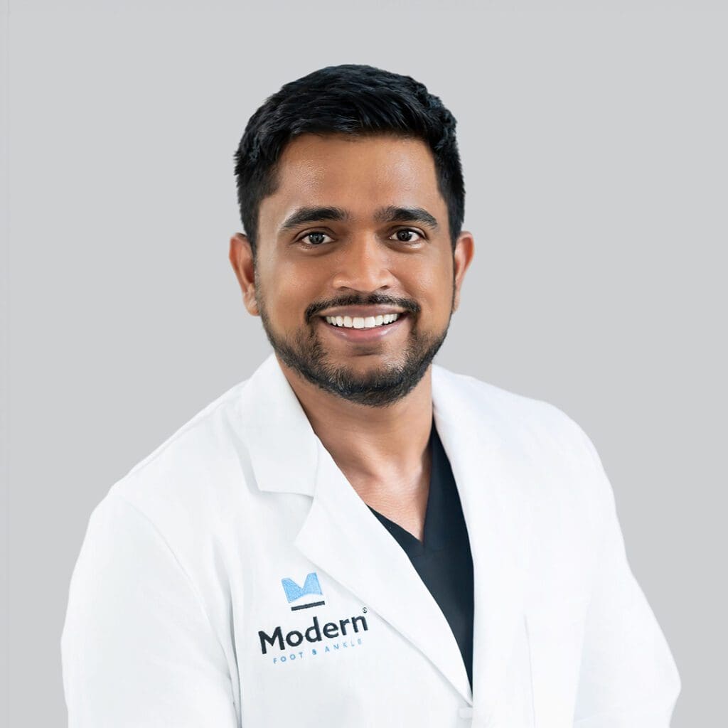 Image of Dr. Trevor Baddaloo, a Orlando, FL-based board-certified Podiatrist, recognized for his personalized care in sports medicine and minimally-invasive surgical techniques.