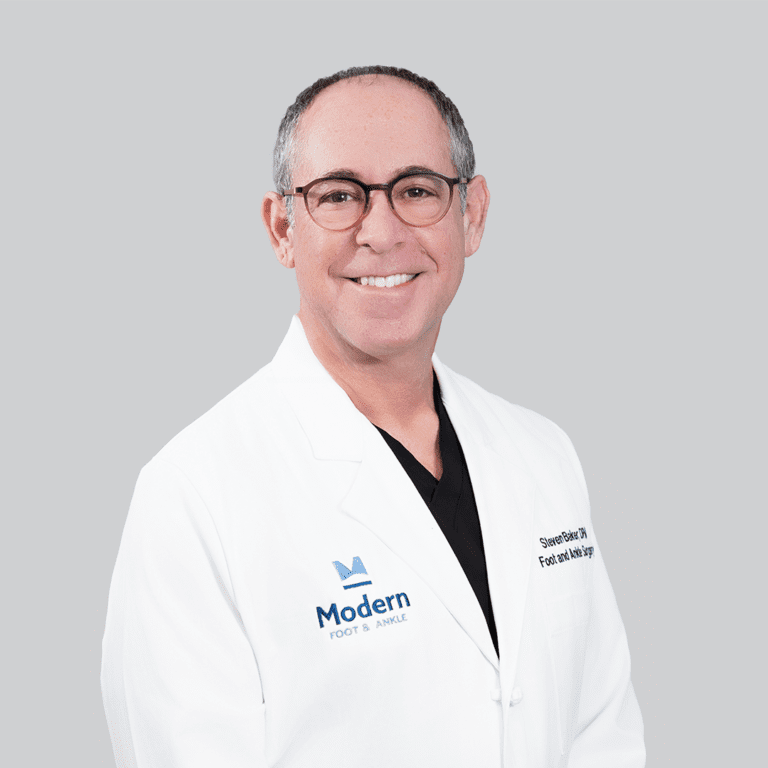 Headshot of Dr. Steven Baker, a male Board Certified Podiatrist in Tampa, known for his expertise in orthotic management and sports injuries of the lower extremity.
