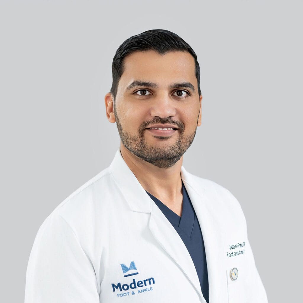 Portrait of Dr. Jalpen Patel, a male podiatrist in Orlando, specializing in minimally-invasive procedures and diabetic limb salvage.