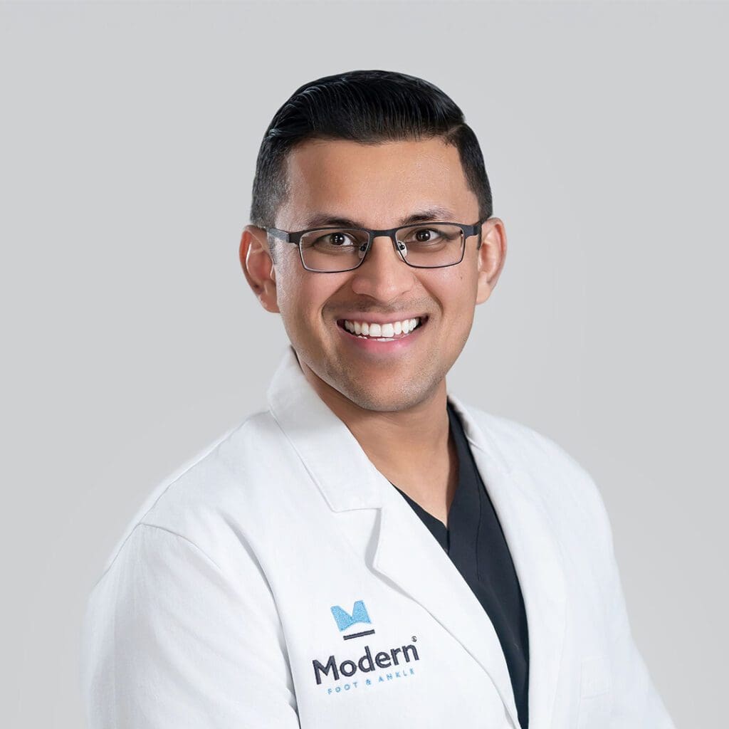 Close-up image of Dr. Sagar Shah, a male Board Certified Podiatrist in Tampa, known for his expertise in sports injuries and wound therapy.