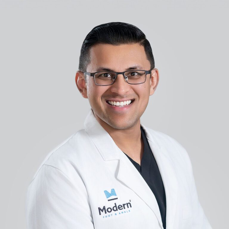 Close-up image of Dr. Sagar Shah, a male Board Certified Podiatrist in Tampa, known for his expertise in sports injuries and wound therapy.