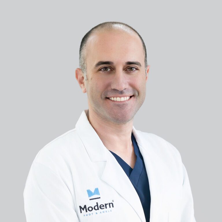 Portrait of Dr. Michael Zuri, a male Board Certified Podiatrist in Tampa, specializing in sports injuries and endoscopic plantar fasciotomies for heel pain.