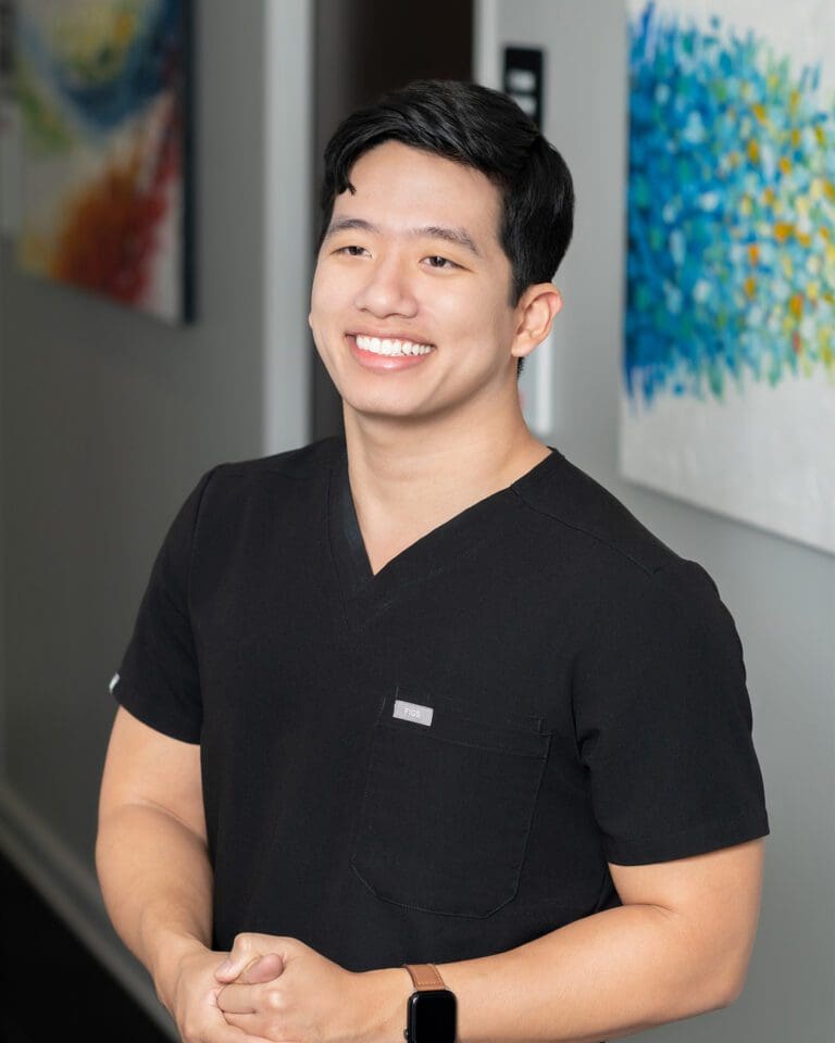 Dr. Phi Huynh, a male Podiatric surgeon in Houston Texas specializing in sports medicine, diabetic foot care, bunion procedures, and hammertoe correction.